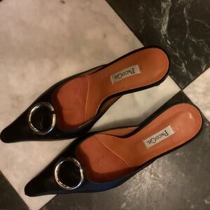 Paco Gil
 Black leather luxurious Mules with Metallic Accent.